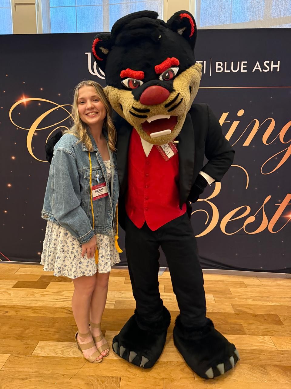 Mackenzie Sauer with bearcat mascot