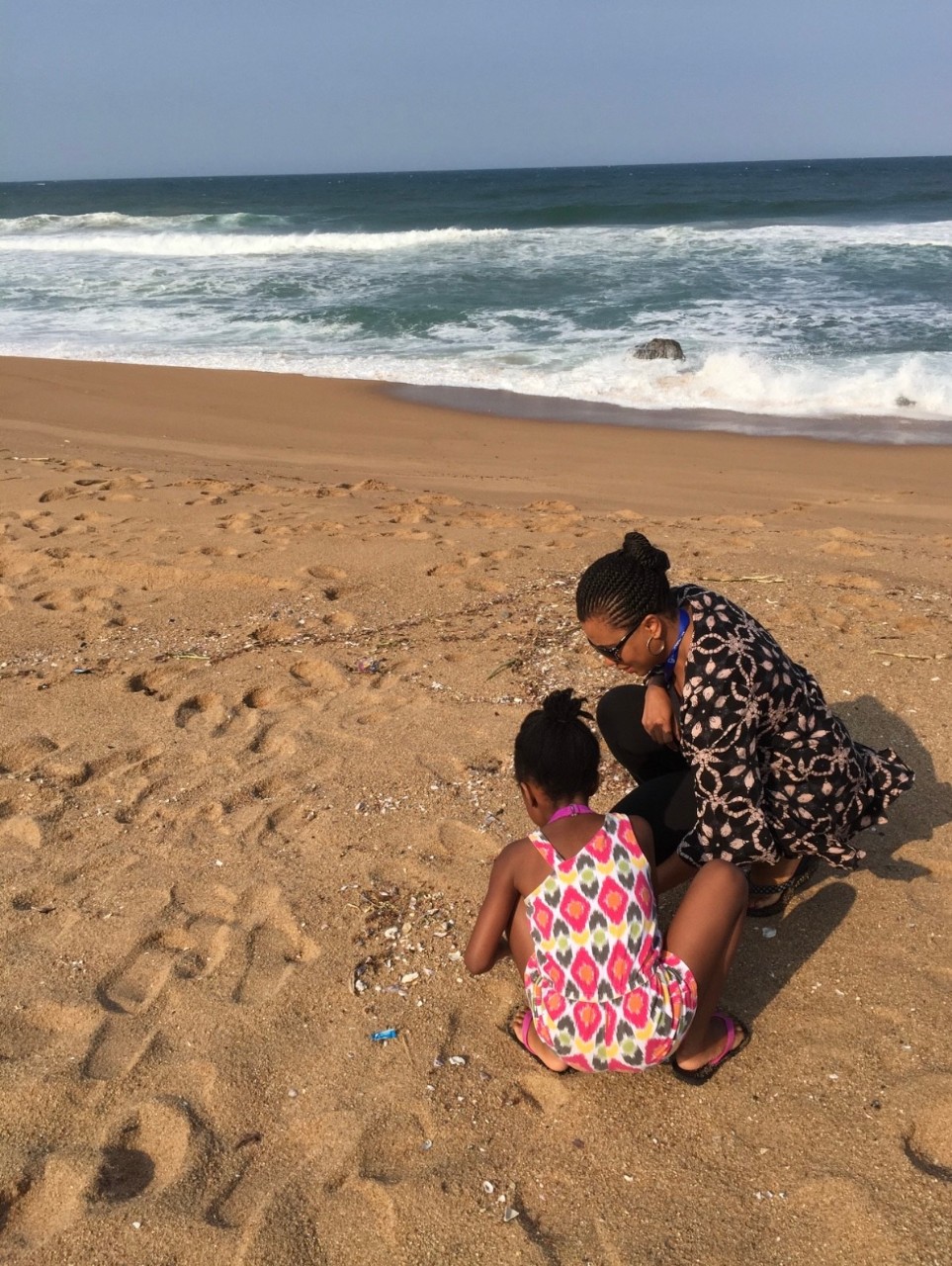 mother and daughter on the beach