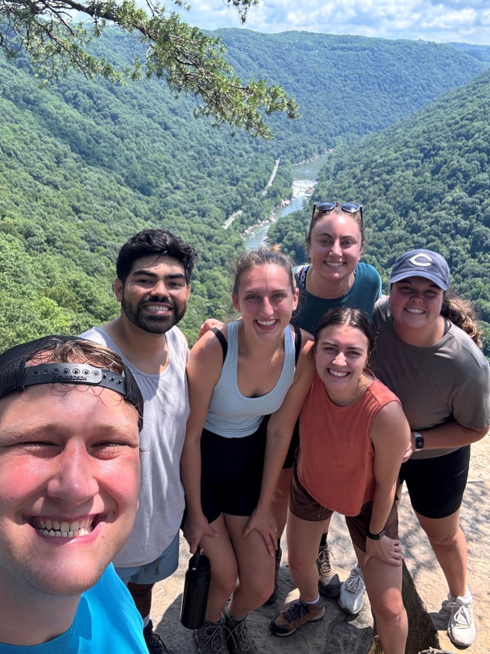 group of hikers near a river