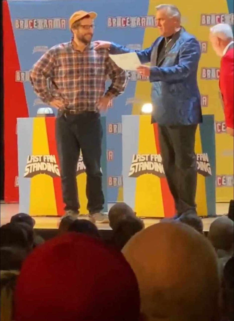 TJ with actor Bruce Campbell on stage