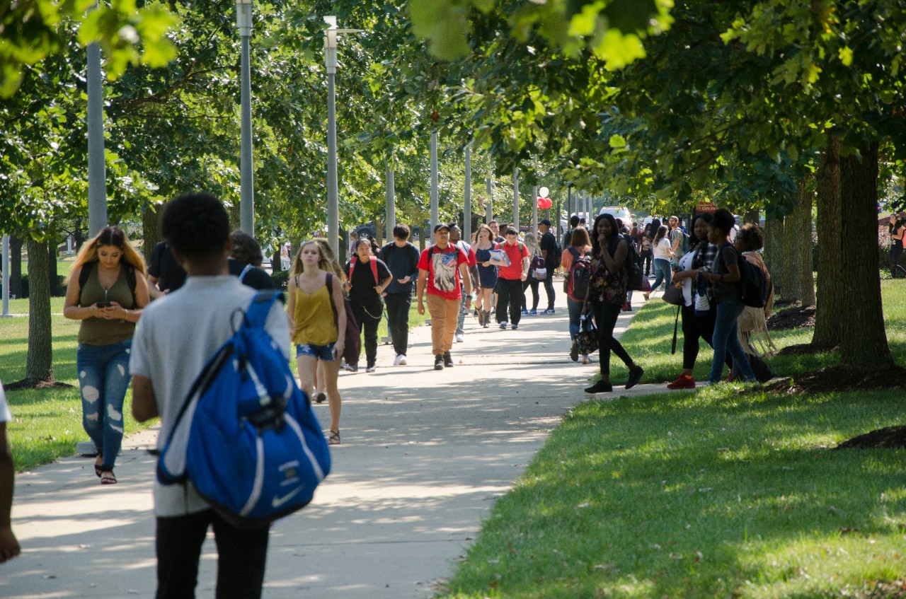 Students walking outside on the UC Blue Ash campus