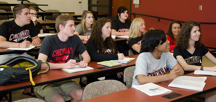 students sitting in class listening
